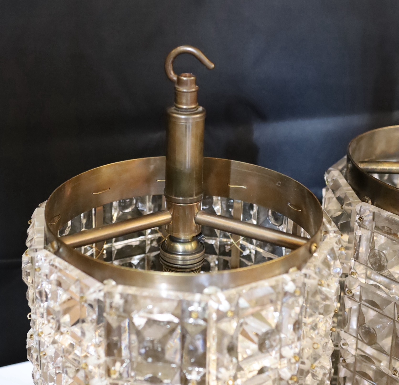 A pair of 1940s style moulded crystal glass and bronze metal ceiling lights, height overall 34cm. diameter 21cm
